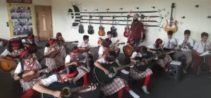 Guitar Room: Tune in, strum along, and create melodies that inspire—our guitar activity is your stage to shine and develop your musical talent!