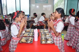 Comfortable and inviting space equipped with a modern flameless kitchen