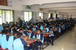 Comfortable and inviting space equipped with a modern flameless kitchen